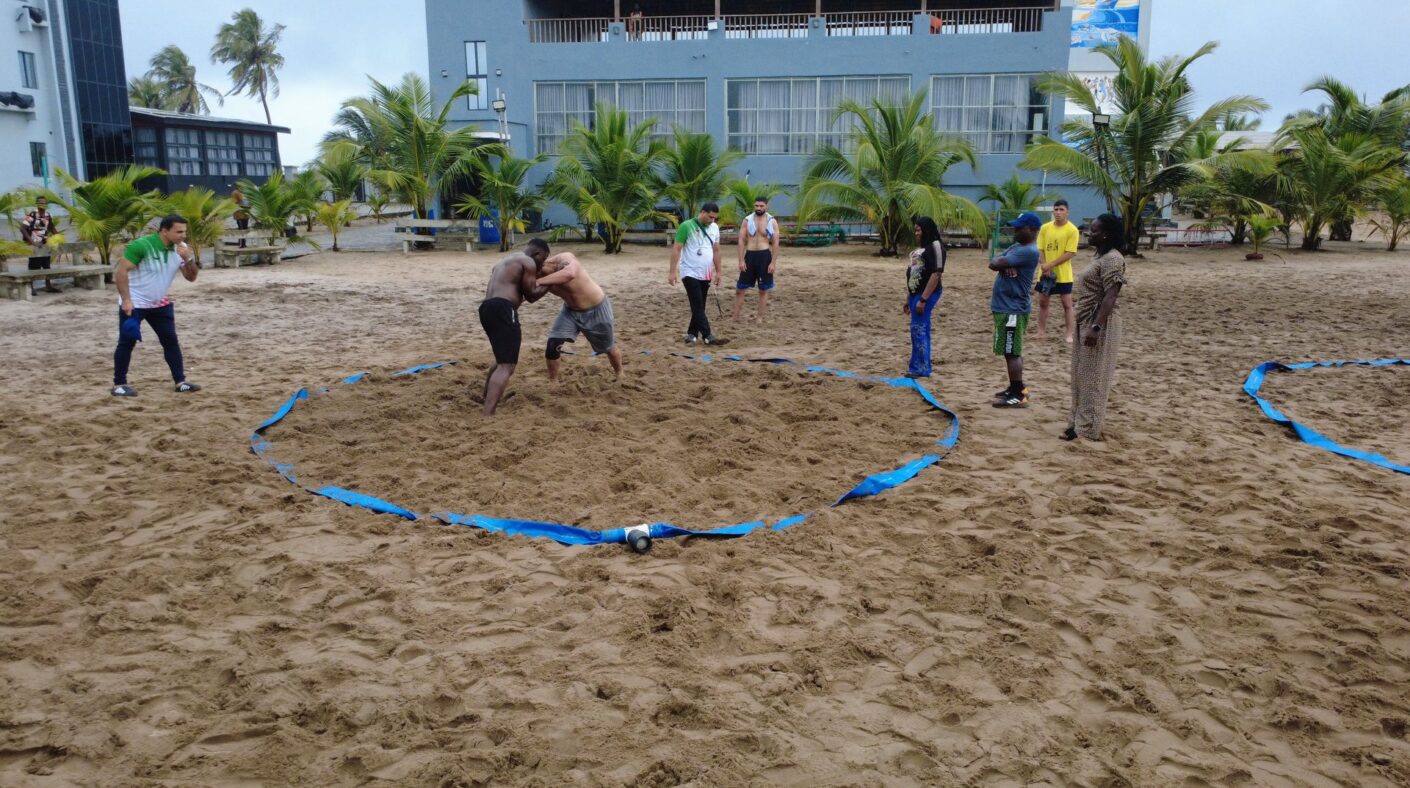 Military beach wrestling activity
