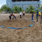Military beach wrestling activity